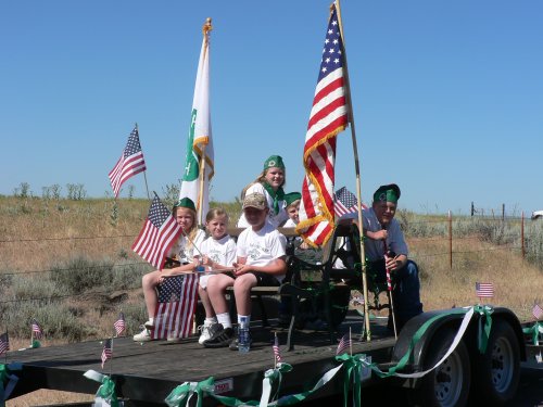 The 4H club on their float with American Flag
