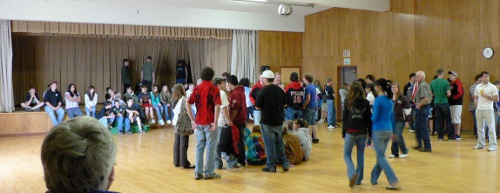 A hall full of evacuated students (having a nice break fro class)