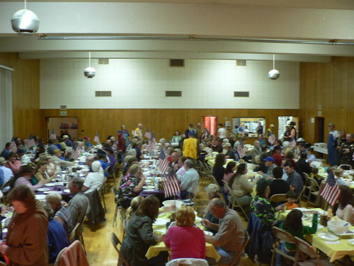 The Memorial Hall filled with tables and people enjoying their crab.