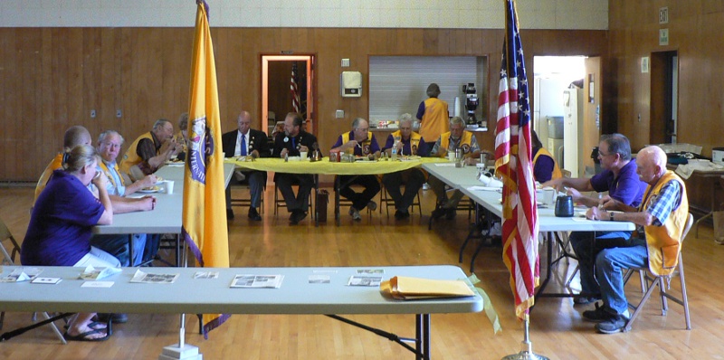 20 or so Lions (the club, not the animal) eat at a special meeting.