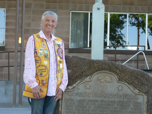 Bitsy McAlexander in front of the Memorial Hall in Bieber